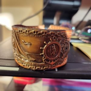 Leather wrist cuff with antique Saint Christopher medal
